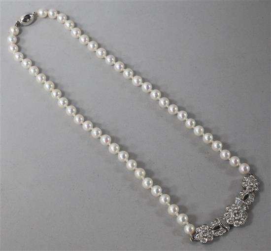 A modern 18ct white gold, cultured pearl and diamond set choker necklace, with a total diamond weight of 2.84cts, 34cm